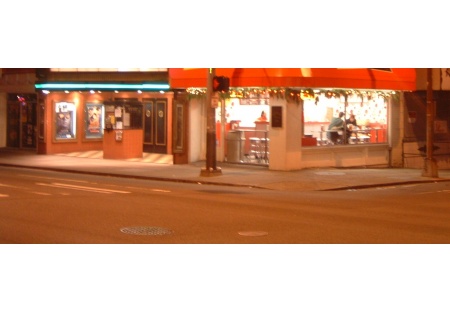 Brand Name Hot Dog and Sandwich shop on visible landmark corner location